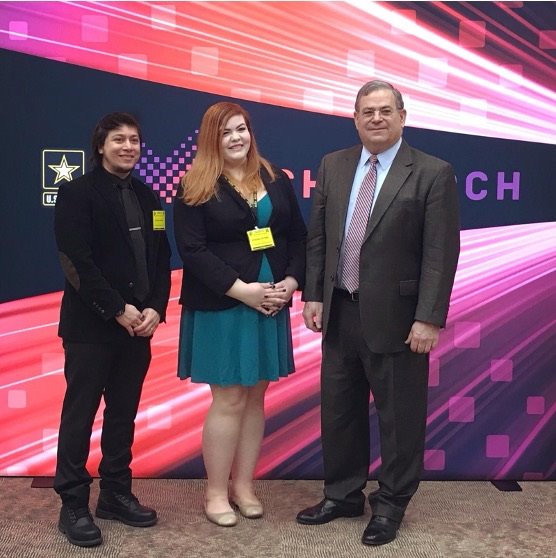 Three people standing